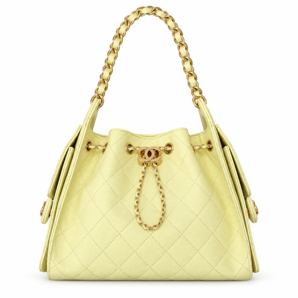 Chanel light yellow caviar quilted bucket bag with gold-tone chain